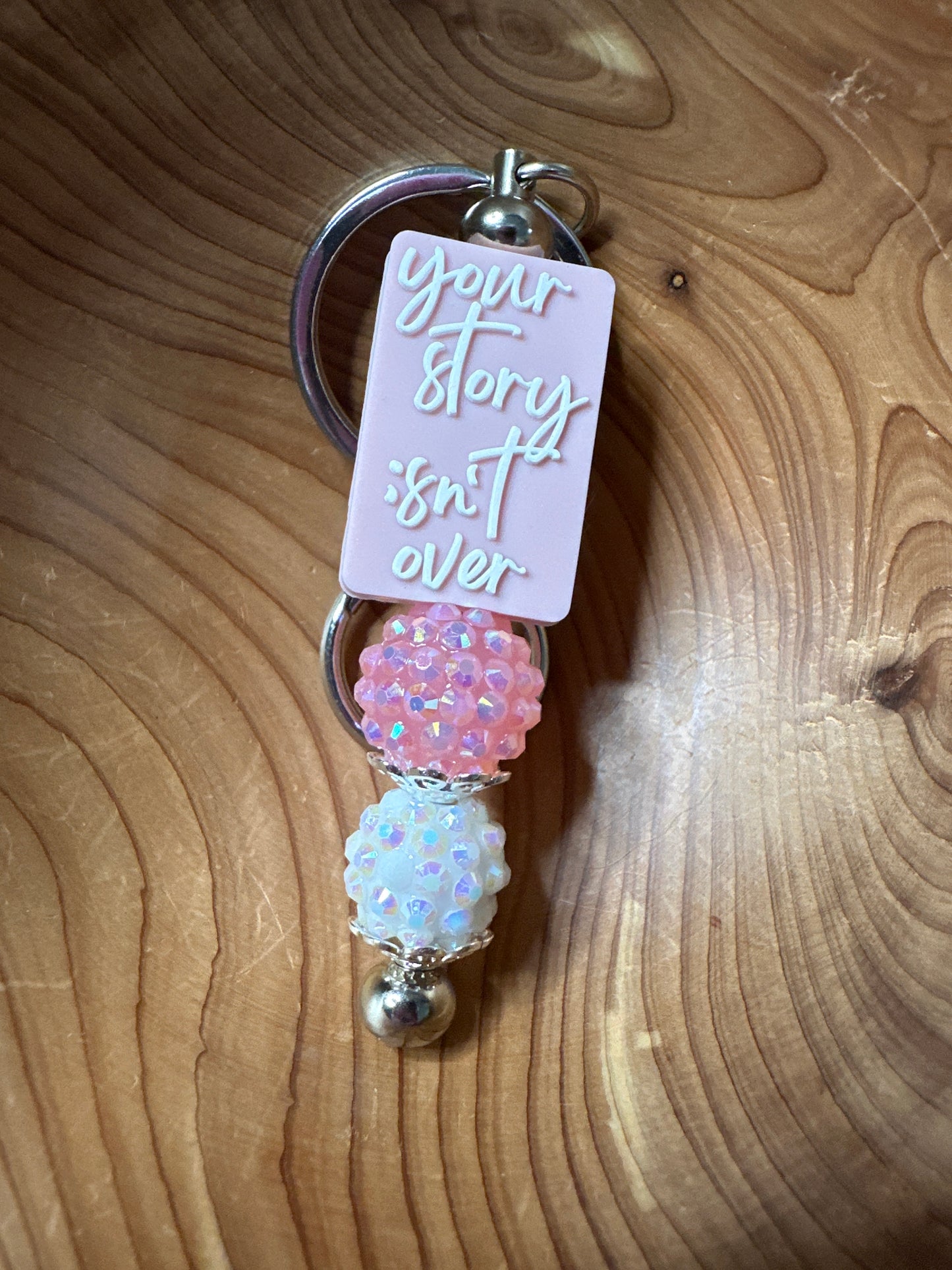 #236 YOUR STORY ISN'T OVER PINK KEYCHAIN BAR